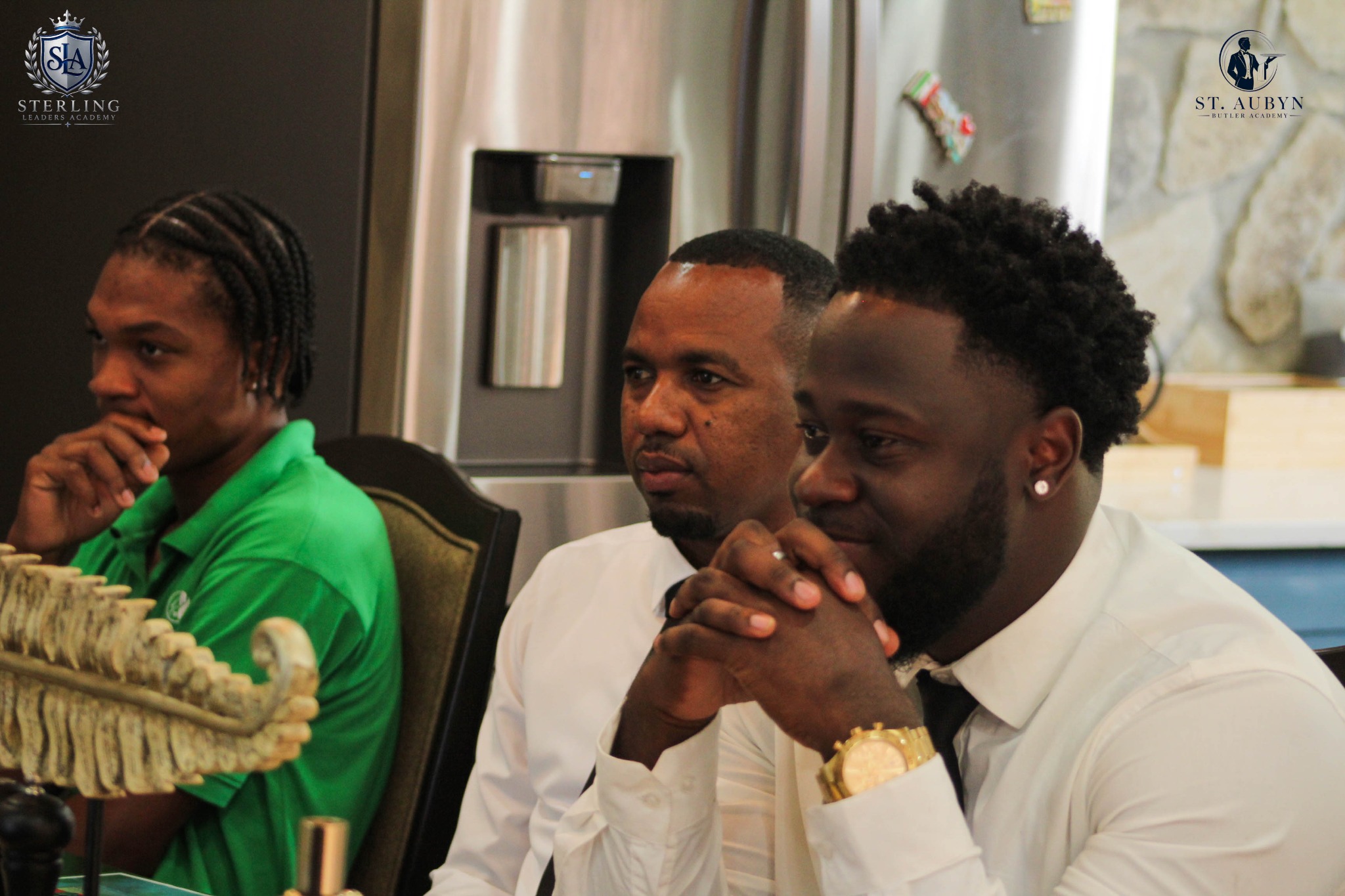 Professionals listening and reflecting during an academy session